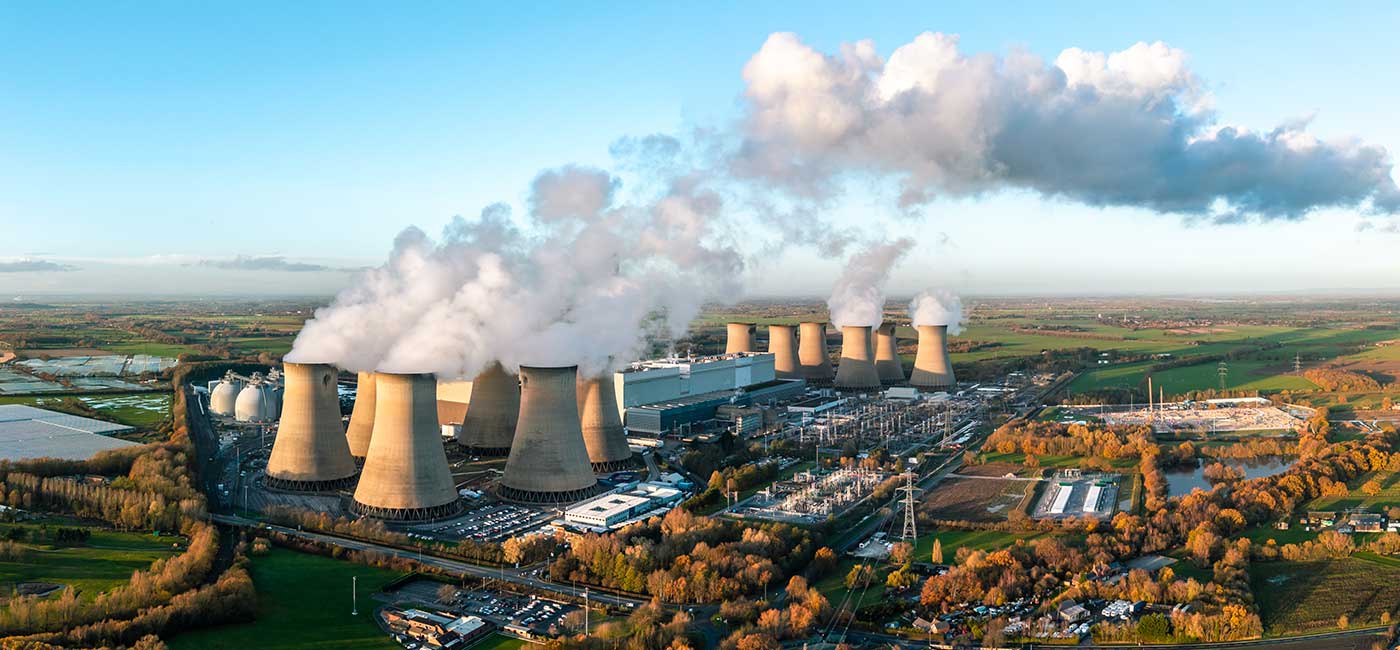 The hulking silhouettes of decommissioned coal, gas, and oil-fired power stations, once symbols of the industrial age, are being reborn as AI data centres.