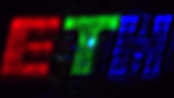 The coloured logo was created using the new ETH researchers‘ Fourier pixels. The letter “E” is roughly 1 millimetre tall on the camera. (Image: Glauser YM, Vonk SJW, et al., Nature 2026)